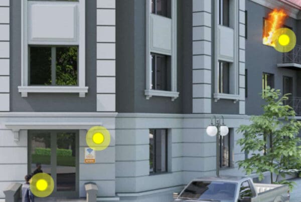 Clickable Coverage® - Property Manager Person Walking Into an Apartment Building with One of the Windows on Fire